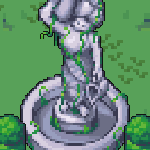 The statue of a banana on its base, with ivy growing up it.
